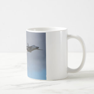 F111 dumpar & bränner kaffemugg