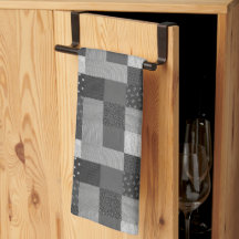 Fack med svartvitt lapptäcke för vintage