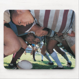 Fackliga spelare för Rugby i en Scrum Musmatta