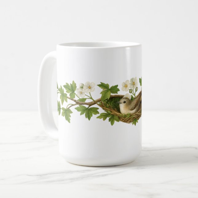 Fågel i fågelnäste på blommande grenar kaffemugg (Framsida vänster)