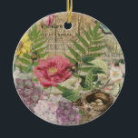 Fågelbo Blommig Trädgård Blomma Fjäril Konst Julgransprydnad Keramik<br><div class="desc">En vacker blommig design för en vintage touch,  med bilder från 1800-talet som visar ett fågelbo,  blommor,  fjäril och fransk script,  allt i collage,  baserat på efemära papper från den viktorianska eran,  sammanställda i en stilfull ny design som är mjuk och tilltalande.</div>