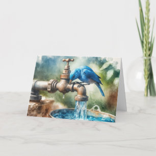 Fågelfågel på en Retro Faucet Kort