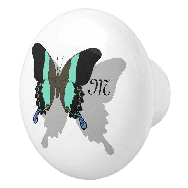 Fågelfjärilsmussskugga, monogram knopp (Höger)