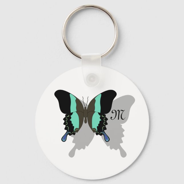 Fågelfjärilsmussskugga, monogram nyckelring (Framsida)