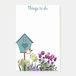 Fågelhus i blomsterträdgård Att göra Post-it Block