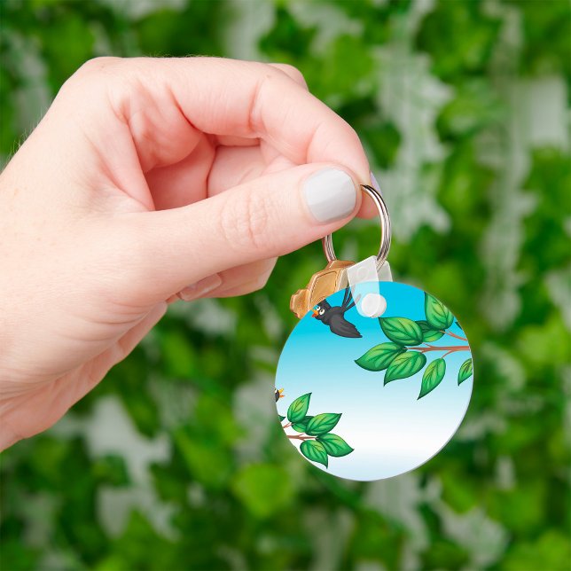 Fåglar i en nyckelkedja i Träd Nyckelring (Skapare uppladdad)