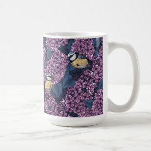 Fåglar i violett laktträdgård kaffemugg