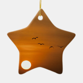 Fåglar som flyger i solnedgång julgransprydnad keramik