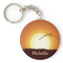 Fåglar som flyger i solnedgångskedjan för Personli