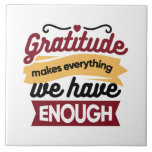 Faith and Gratitude Artwork – Uplifting Christian  Kakelplatta<br><div class="desc">Celebrate the power of gratitude with this inspirational Christian quote: 'Gratitude makes everything we have enough.' A beautiful faith-based design for decor,  apparel,  and gifts. #Thankfulness #Grateful</div>