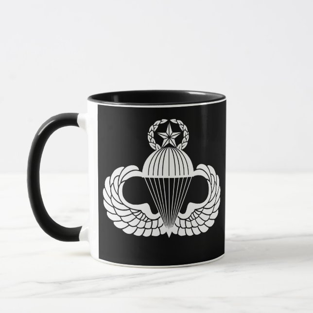 Fallskärmsmärket, Mästare Mugg (Vänster)
