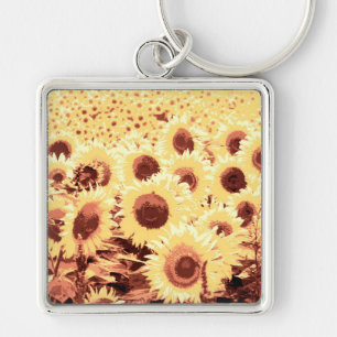 Fält av solblommor - bruna, guld och gult fyrkantig silverfärgad nyckelring