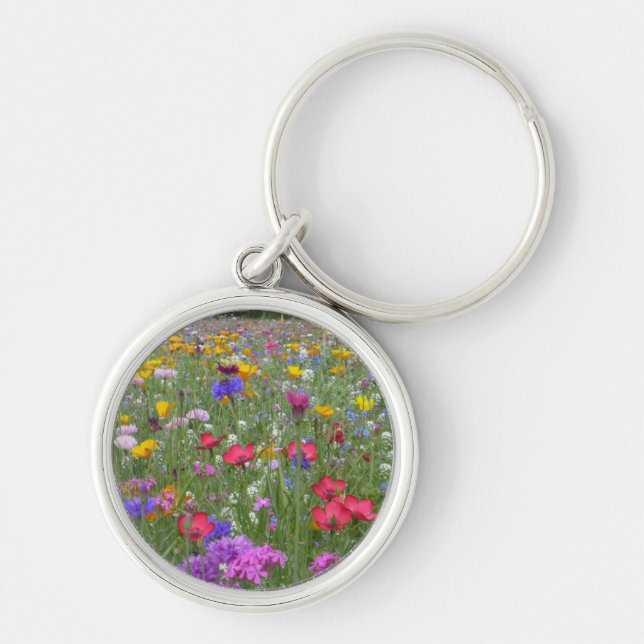 Fält i färgade blommor rund silverfärgad nyckelring (Framsidan)