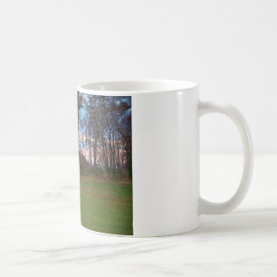 Fält i Hjort och en Rosa SunSet Kaffemugg
