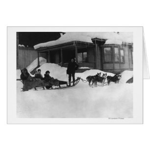 Familj som reser med Hund Sled i Alaska Hälsningskort