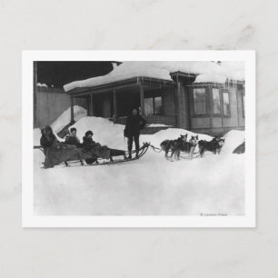 Familj som reser med Hund Sled i Alaska Vykort