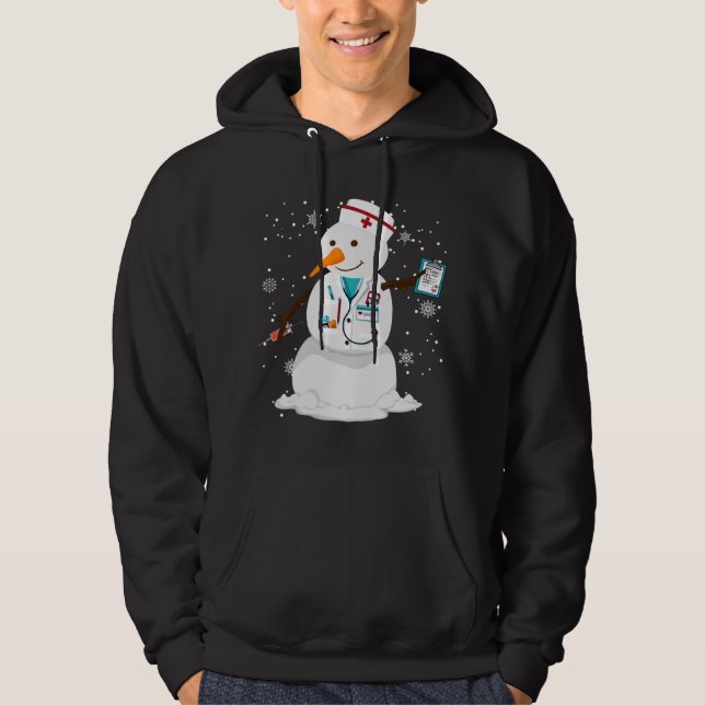 Familjens vintersjuksköterska i snögubbe julgran hoodie (Framsida)