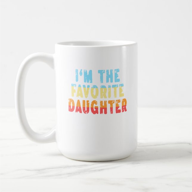 Family Favorites Gifts & more I'm The Favorite Dau Kaffemugg (Vänster)