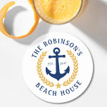 Family Namn Beach House Anchor Guld Laurel White Underlägg Papper Rund<br><div class="desc">En snyggt nautisk uppsättning pappra underlägg med din personlig familj namn och strandhus,  sjö hus eller annan önskad text och fastställt datum. Har en designad ankarplats för anpassningsbar med löv för guld stil och en stjärna på vitt eller anpassar enkelt färg för att matcha din nuvarande dekorfärg eller tema.</div>
