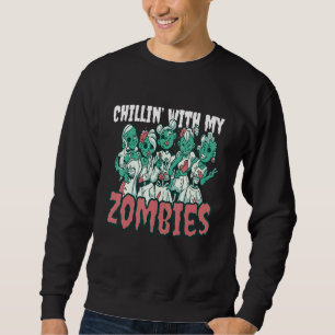 Fantastisk läskig zombie tjej kostym chillar med lång ärmad tröja