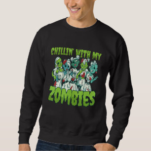 Fantastisk läskig zombie tjej kostym chillar med lång ärmad tröja