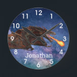 Fantasy Wyvern Fire Breathing Dragon Monogram   Rund Klocka<br><div class="desc">Den här designen har skapats genom digital grafik. Det kan vara personlig i området att tillhandahålla eller anpassa genom att klicka för att anpassa ytterligare alternativ och ändra namn, initialer eller ord. Du kan också ändra texten färg och stil eller ta bort texten för en bilddesign. Kontakta mig på colorflowcreations@gmail.com...</div>