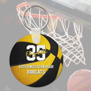 färg av det svarta guld-basketlaget nyckelring