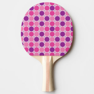 Färg pricker i lilor och lila pingisracket