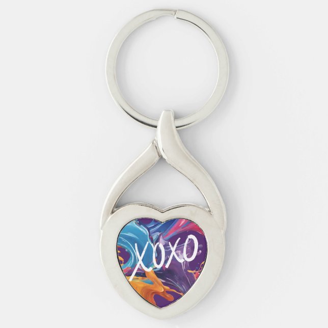 Färgämnet XOXO- Twisted Heart Silverfärgad Nyckelring (Framsidan)
