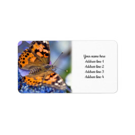 Färgat Dam Butterfly på ett blått Hydrangea Adressetikett