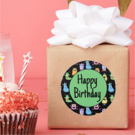 Färgbara jutemonster runt klistermärke