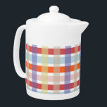 Färgbelagd tekanna i Mönster keramik<br><div class="desc">Multifärgad sommarplatta/kontrollera tekannan i mönster. Skuggor av lila,  himlar-blått,   rosa,  gult,  orange,  hallon och lila färg för att matcha alla dekorationer och brista upp ditt kök eller kontor under vår och sommarmånader.</div>
