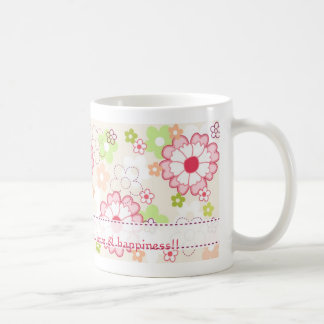 Färgblommor av blommigt mugg