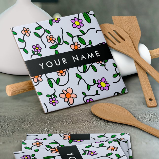 Färgblommor, blå bakgrund, svart kakelplatta (Skapare uppladdad)