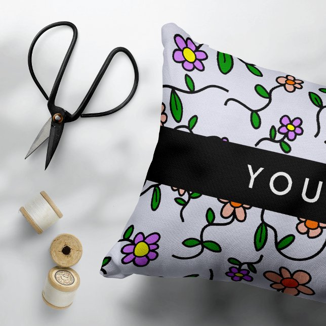 Färgblommor, blå bakgrund, svart prydnadskudde (Skapare uppladdad)