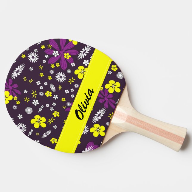 Färgblommor på svart pingisracket (Sidan)
