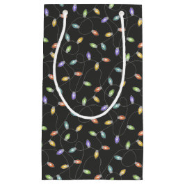 Färgfläckad ljus garland mönster på svart