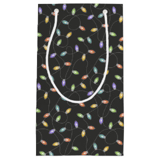 Färgfläckad ljus garland mönster på svart