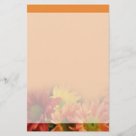 Färgfläckar, gult och daisy av orange. brevpapper