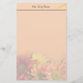 Färgfläckar, gult och daisy av orange. brevpapper