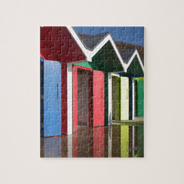 Färgfläckblå strandhinnor av gult | Hytter Pussel (Vertikal)