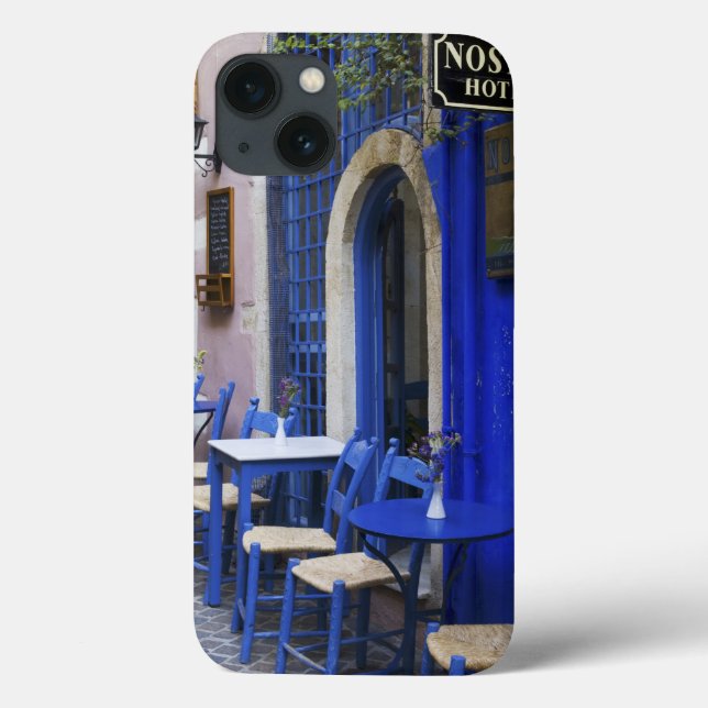 Färgfull blå dörr och på väg till gammalt hotell p (Baksida)