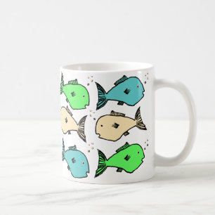 Färgfull tropisk fisk på en kaffemugg