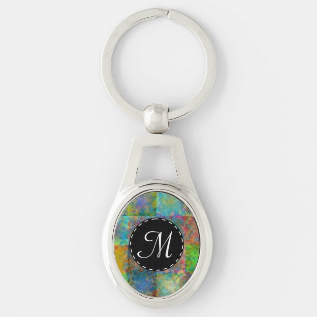 Färgfyllda abstrakter ovalt silverfärgad nyckelring (Framsidan)