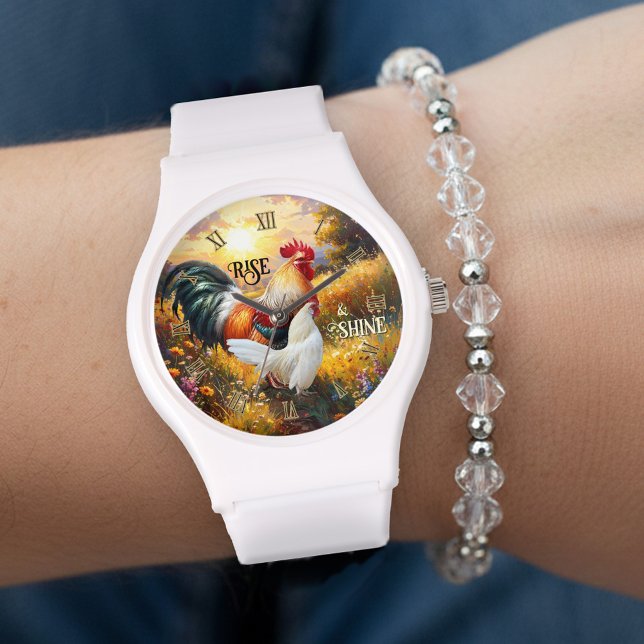 Färgglad stig upp och lys ur rosett armbandsur (Rise and shine watch featuring a colorful painting of two roosters at sunrise)