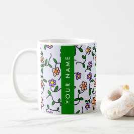 Färgglada blommor, blå bakgrund, grön kaffemugg