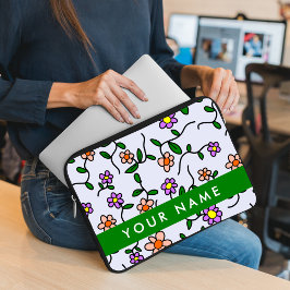 Färgglada blommor, blå bakgrund, grön laptop fodral