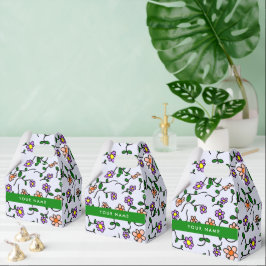 Färgglada blommor, blå bakgrund, grön presentaskar