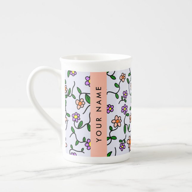 Färgglada blommor, blå bakgrund, orange benporslin mugg (Vänster)