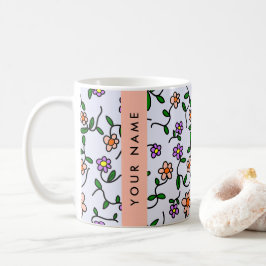 Färgglada blommor, blå bakgrund, orange kaffemugg